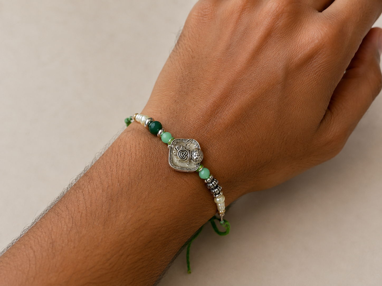 NR-06 Emerald Charm Rakhi — image 1
